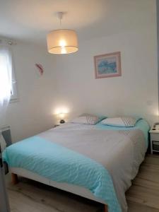 Postel nebo postele na pokoji v ubytování Le gîte Bellevue