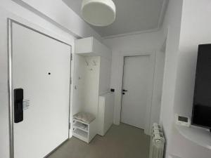 Et tv og/eller underholdning på Eleven Odyssey Apartment