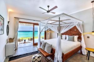 En eller flere senge i et værelse på Delphina + 63 billeder