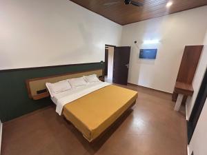 En eller flere senge i et værelse på Serene Hill View Cottage