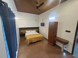 En eller flere senge i et værelse på Serene Hill View Cottage