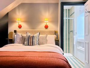 Postel nebo postele na pokoji v ubytování nap Hotel King Square