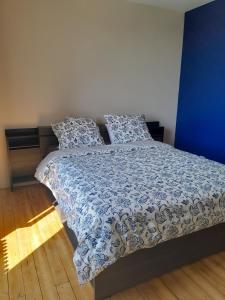 En eller flere senge i et værelse på Grande chambre lumineuse