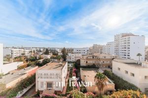 an aerial view of a city with buildings at Aura - 1 BR - Premium Apartment in Maarif
