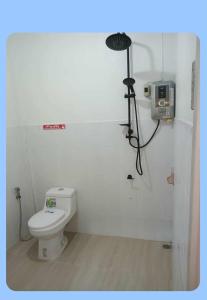 Koupelna v ubytování ບ້ານ ດາວເຈົ້າ