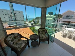 En balkon eller terrasse på Cód 41 - Cobertura a 80 metros do mar