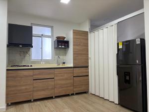 Nhà bếp/bếp nhỏ tại 2325 Apartaestudios +16 ảnh