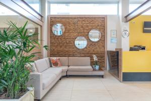 Χώρος καθιστικού στο Slim Pajuçara by Tropicalis