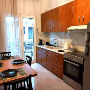 Køkken eller tekøkken på MaisonCentrale Apartment Downtown