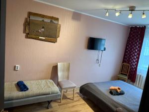 TV a/nebo společenská místnost v ubytování Mõisavahe 30 two big beds 1 single bed