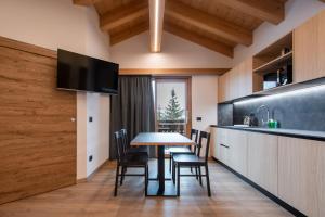 Kuchyň nebo kuchyňský kout v ubytování Chalet Layla