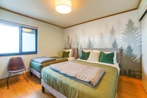 En eller flere senge i et værelse på Stunning Ocean Views! Oregon Coast Condo