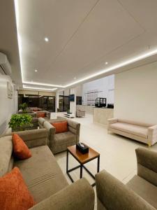 Гостиная зона в شقق كالم للشقق المخدومه 4