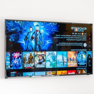 a tv screen with a bunch of movies on it at Modern Two Bed Apartment - Sleeps 3 - WiFi & Parking Included 57C in Sleightholme +15 photos