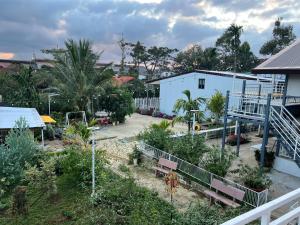 a view of a garden with trees and plants at Mia Homestay and Coffee in Bảo Lộc