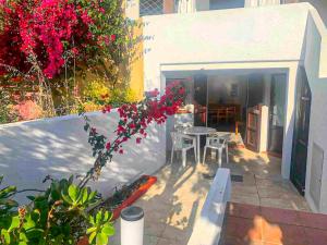 En terrasse eller udendørsområde på Casa Elicriso + 1 billede