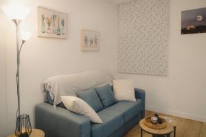 Et opholdsområde på Apartamento Fama + 20 billeder