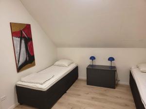 En eller flere senge i et værelse på New Holiday Home With Sea View And Spa