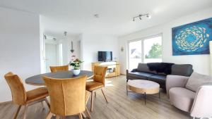 TV a/nebo společenská místnost v ubytování Dinkelbach Feriendomicil Objekt 2 D