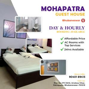 En eller flere senge i et værelse på Mohapatra Guest House