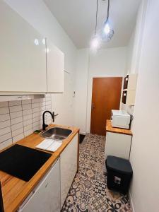 Køkken eller tekøkken på La Suite Sarrail Hypercentre Boulingrin