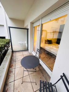En balkon eller terrasse på La Suite Sarrail Hypercentre Boulingrin + 2 billeder