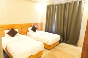 Voodi või voodid majutusasutuse Sufi Stay toas