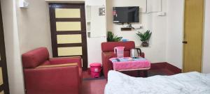 Et tv og/eller underholdning på Nakshatra Cottage + 14 billeder