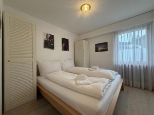 Ένα ή περισσότερα κρεβάτια σε δωμάτιο στο Casa Las Muotas