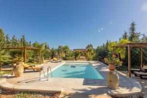 Swimmingpoolen hos eller tæt på Villa Renedda