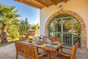 En terrasse eller udendørsområde på Villa Renedda