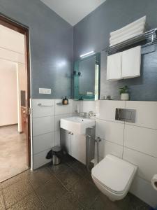 Koupelna v ubytování Urban Opulence