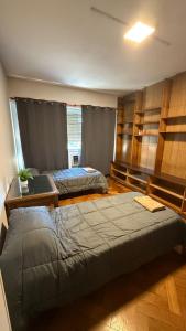 Postel nebo postele na pokoji v ubytování Hermoso departamento con vista a Obelisco lV