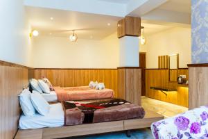 Postel nebo postele na pokoji v ubytování The Dzong ! MG MARG GANGTOK