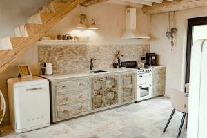 Η κουζίνα ή μικρή κουζίνα στο La suite Hindi