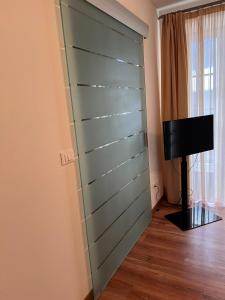 Et tv og/eller underholdning på Appartamento Family Park2