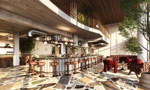 a rendering of a bar in a restaurant at Hotel Indigo London K West Shepherd's Bush by IHG in London +2 photos