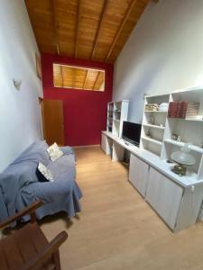 TV a/nebo společenská místnost v ubytování Casa