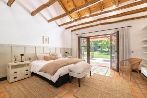 Postel nebo postele na pokoji v ubytování Casona Pirque