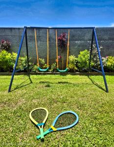 Herní místnost nebo prostor pro děti v ubytování Teahupo'o Lodge Tahiti - Fare Terre et Mer - climatisé - canoe et paddle