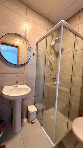 Et badeværelse på Flamingo Pé na areia - Centro/Guaratuba