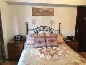 Postel nebo postele na pokoji v ubytování smithy lodge guest house