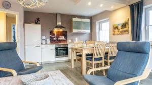 Kuchyň nebo kuchyňský kout v ubytování CarpeDiem