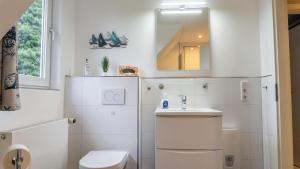 Koupelna v ubytování CarpeDiem + 14 fotografií