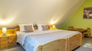 Postel nebo postele na pokoji v ubytování CarpeDiem