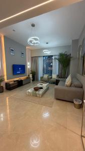 Posezení v ubytování Boulevard Sea View Luxury 1 BR Next Dubai Mall