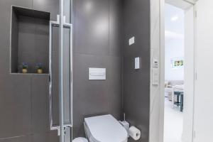 Koupelna v ubytování Campo Golf 19 by VillaGranCanaria + 45 fotografií