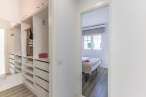 Postel nebo postele na pokoji v ubytování Campo Golf 19 by VillaGranCanaria