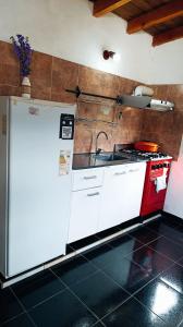 Køkken eller tekøkken på Nuestro Lugar