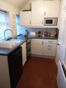 Køkken eller tekøkken på White Gate Lodge + 5 billeder